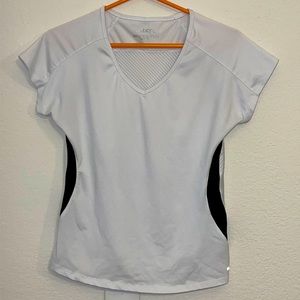 BCG size medium, white and black moisture-wicking technology workout top.